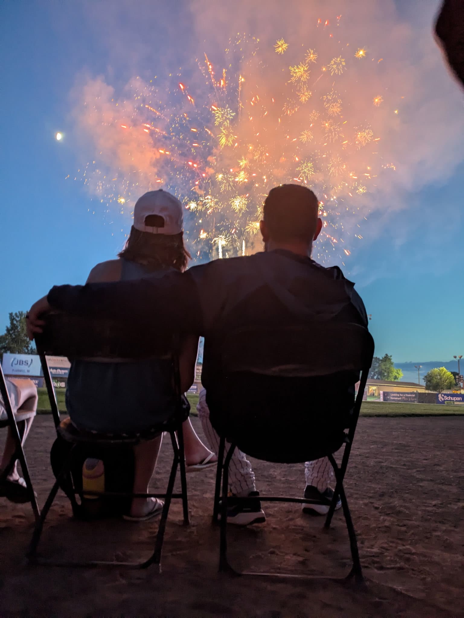 Cody and Ashley watching fireworks at the ballpark